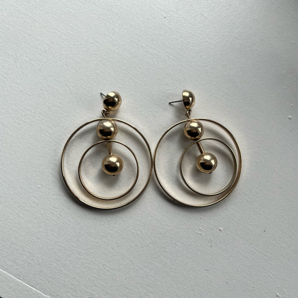 Gold circle statement earrings